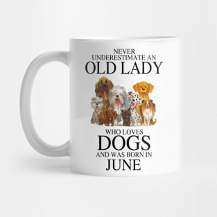 Never Underestimate An Old Lady Who Loves Dogs And Was Born In June Mug